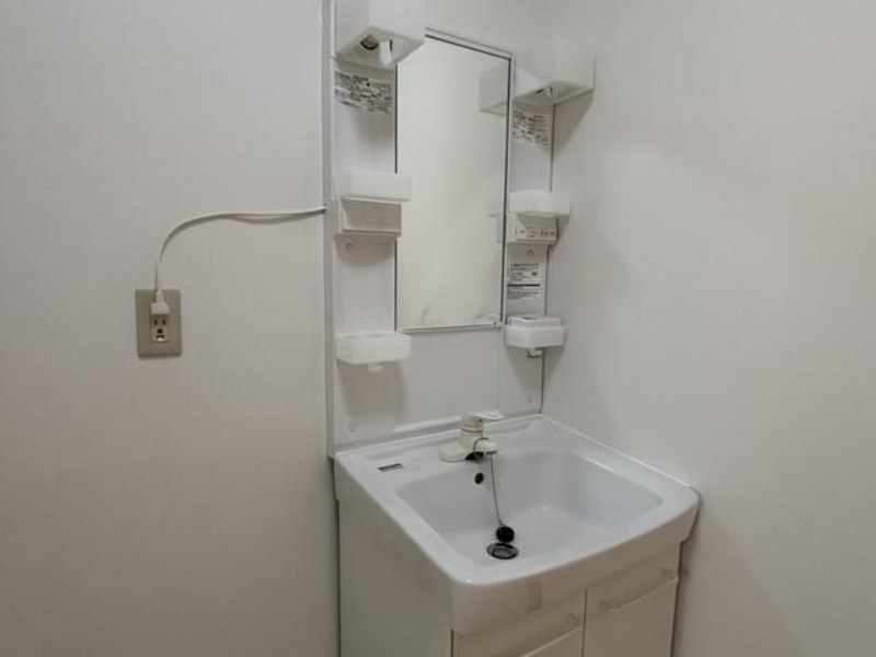 ��ʌ�����s����T���ڂ̃A�p�[�g�̐��ʏ�