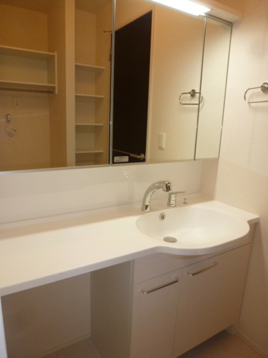 ��ʌ�����s����P���ڂ̃A�p�[�g�̐��ʏ�