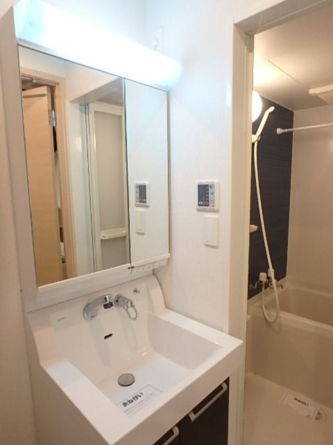 ��ʌ��������܎s�Y�a��ݒ��T���ڂ̃A�p�[�g�̐��ʏ�