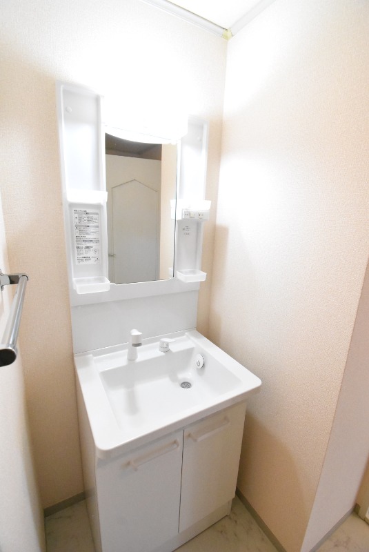 ��ʌ��������܎s�Y�a���؍�T���ڂ̃A�p�[�g�̐��ʏ�