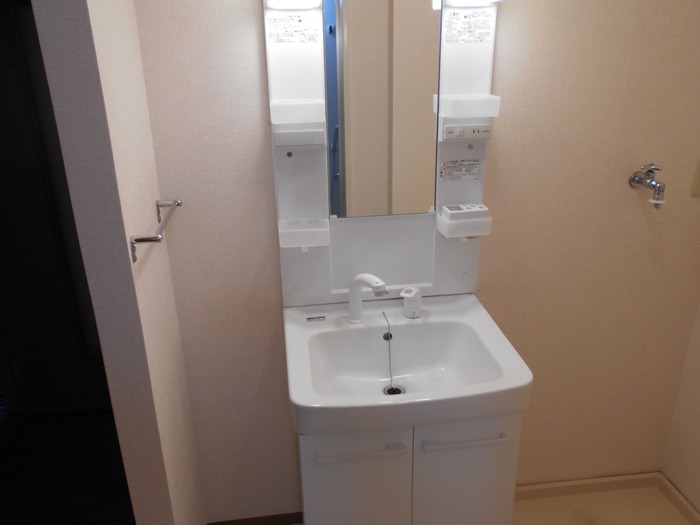 ��ʌ��z�J�s���������̃A�p�[�g�̐��ʏ�