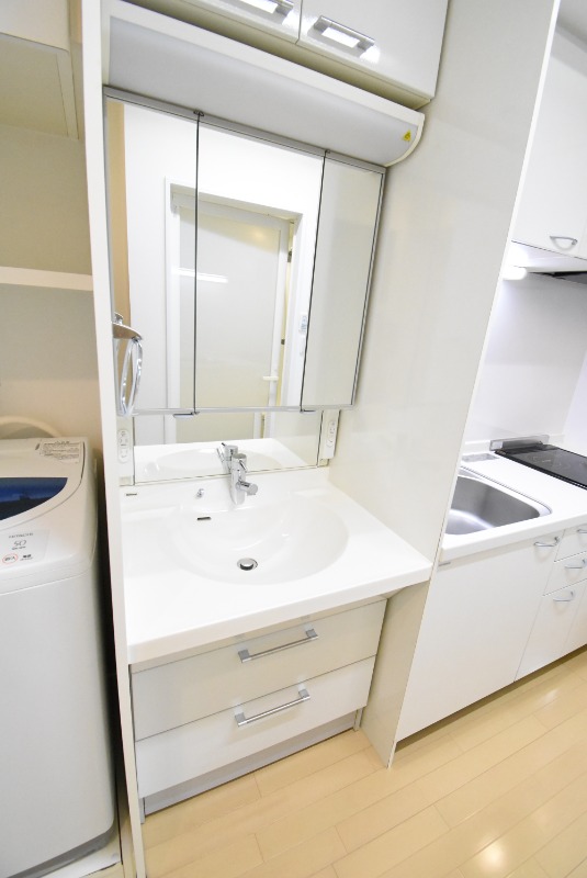 ��ʌ��������܎s��{����ؒ��S���ڂ̃}���V�����̐��ʏ�