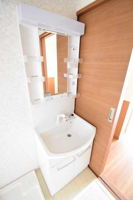 ��ʌ��������܎s��{�捂�@���Q���ڂ̃}���V�����̐��ʏ�