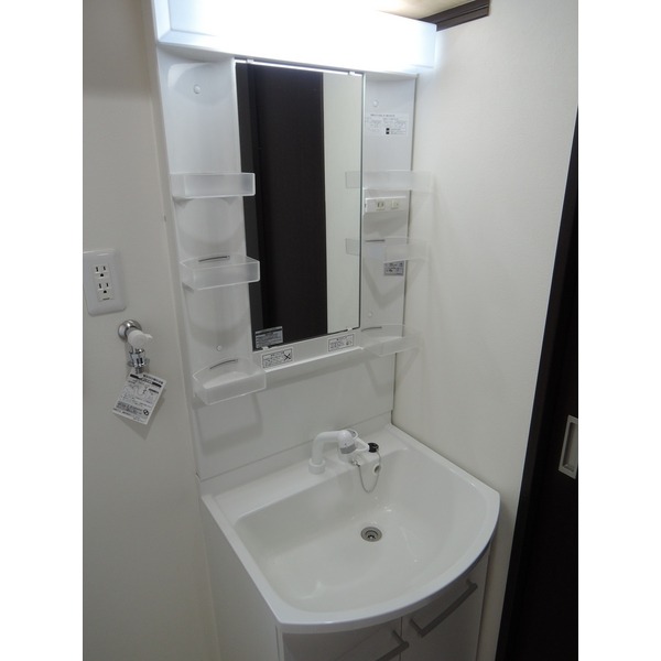 ��ʌ��������܎s�΋�厚�����̃A�p�[�g�̐��ʏ�