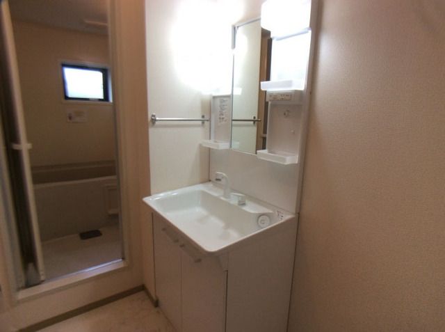 ��ʌ��k�����S�ɓޒ������R���ڂ̃A�p�[�g�̐��ʏ�