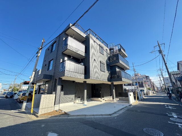 ��ʌ�����s�핽�Q���ڂ̃}���V�����̌����O��