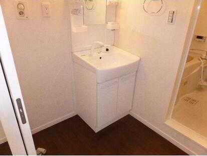 ��ʌ��������܎s�k��{�����R���ڂ̃}���V�����̐��ʏ�