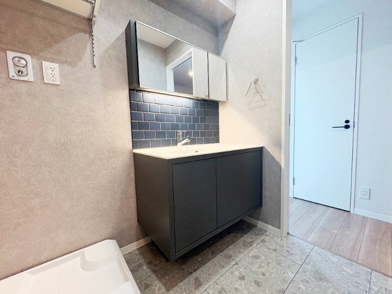 ��ʌ��������܎s��{��O���P���ڂ̃}���V�����̐��ʏ�