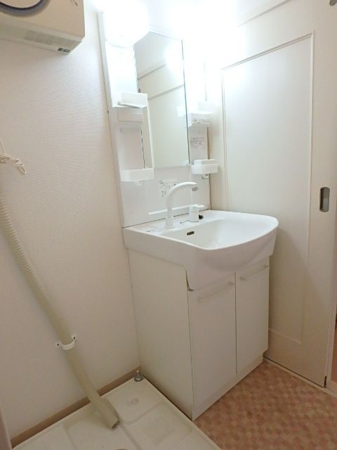 ��ʌ��������܎s��{��O���Q���ڂ̃}���V�����̐��ʏ�