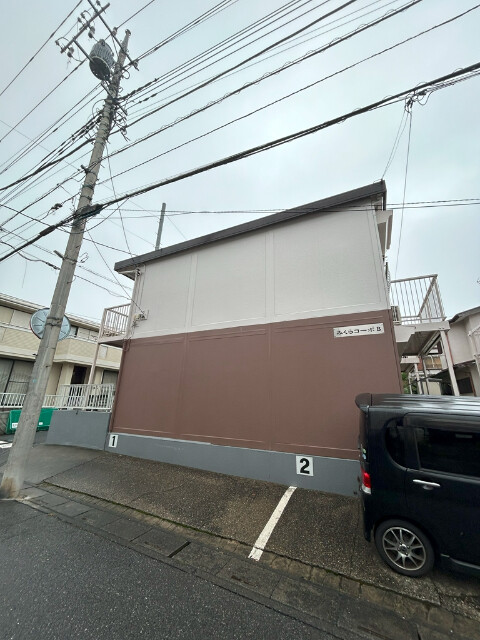 ��ʌ��������܎s������厚�䑠�̃}���V�����̒��ԏ�