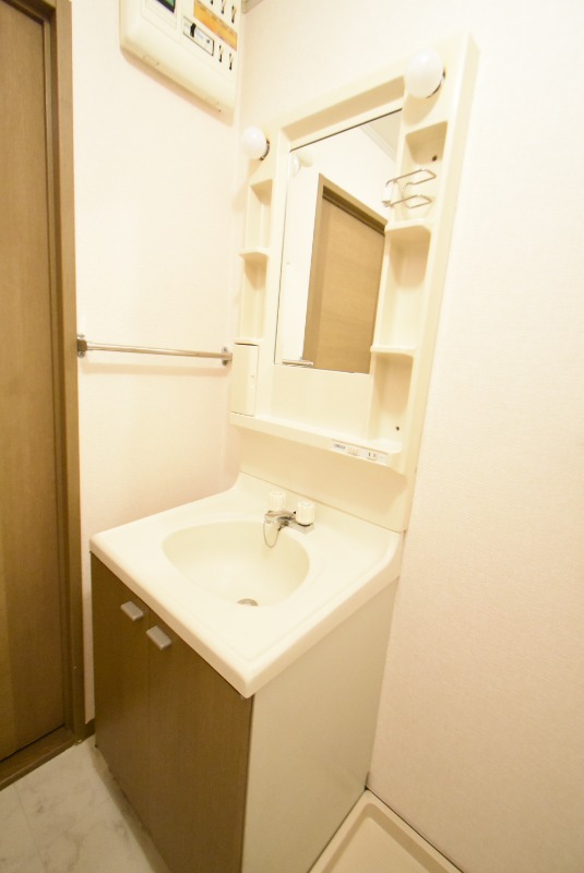 ��ʌ��������܎s�k����i���Q���ڂ̃A�p�[�g�̐��ʏ�