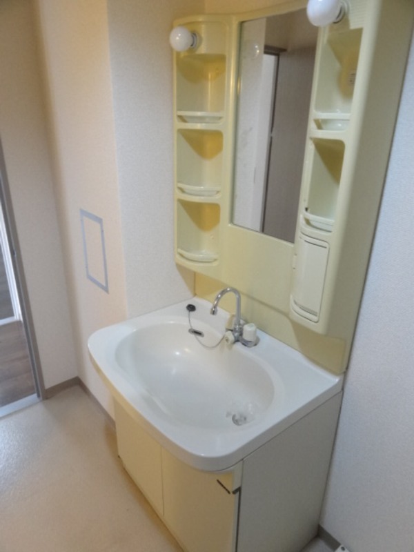 ��ʌ��������܎s��{����ؒ��S���ڂ̃}���V�����̐��ʏ�