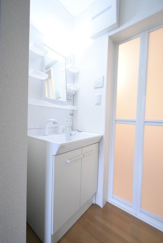 ��ʌ�����s����T���ڂ̃A�p�[�g�̐��ʏ�