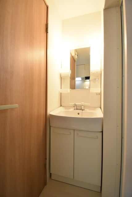 ��ʌ��������܎s�k����i���Q���ڂ̃A�p�[�g�̐��ʏ�