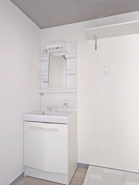 ��ʌ��������܎s��{��㏬���̃A�p�[�g�̐��ʏ�