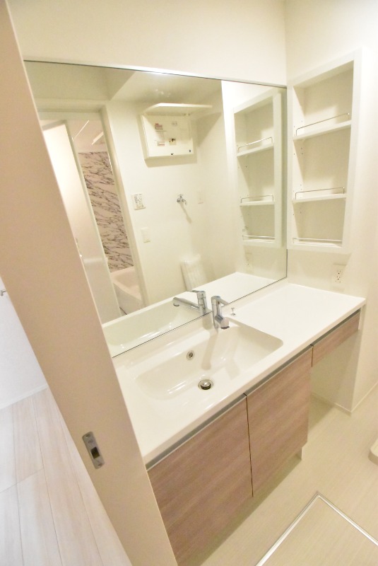 ��ʌ��������܎s�΋�����T���ڂ̃A�p�[�g�̐��ʏ�