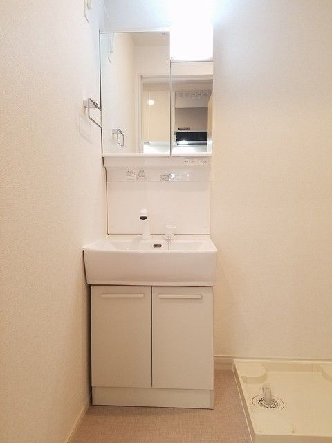 ��ʌ�����s�厚���s�̃A�p�[�g�̐��ʏ�