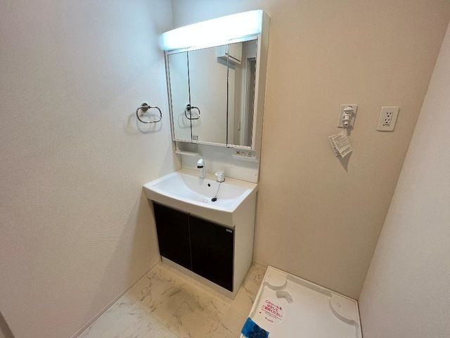 ��ʌ�����s�씵���J�Q���ڂ̃A�p�[�g�̐��ʏ�