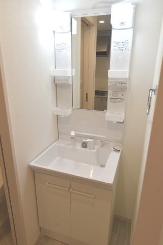 ��ʌ������s�h���R���ڂ̃A�p�[�g�̐��ʏ�