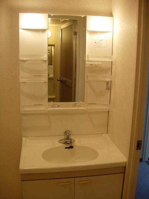 ��ʌ��������܎s��{��������P���ڂ̃}���V�����̐��ʏ�