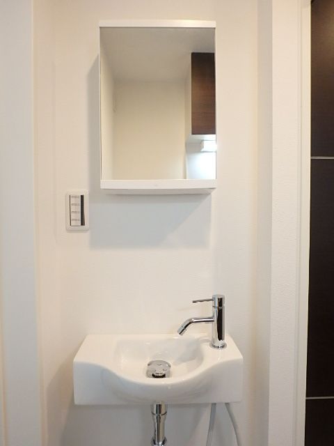 ��ʌ��������܎s��{��{���T���ڂ̃A�p�[�g�̐��ʏ�