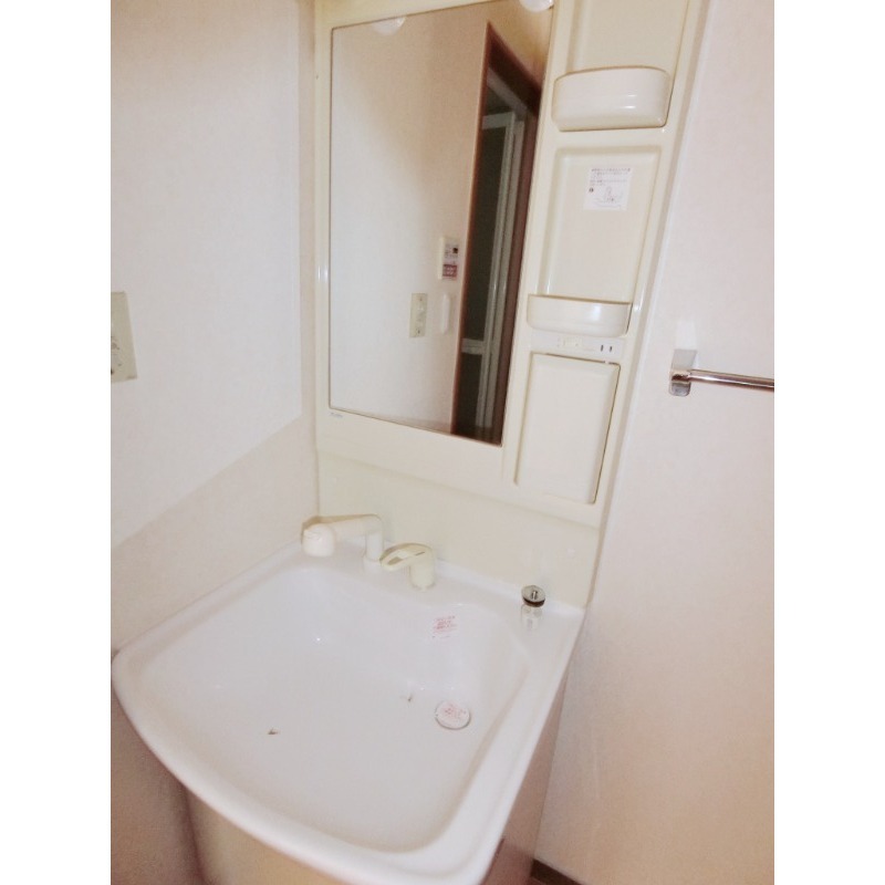 ��ʌ�����s����R���ڂ̃}���V�����̐��ʏ�