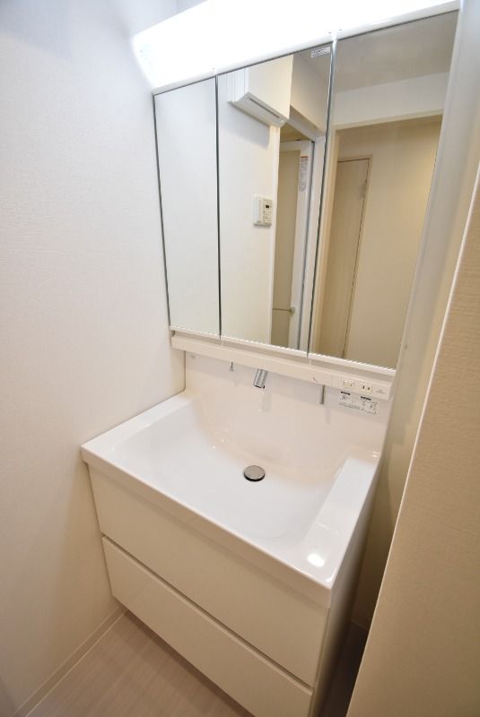 ��ʌ��������܎s�Y�a���ՂT���ڂ̃}���V�����̐��ʏ�