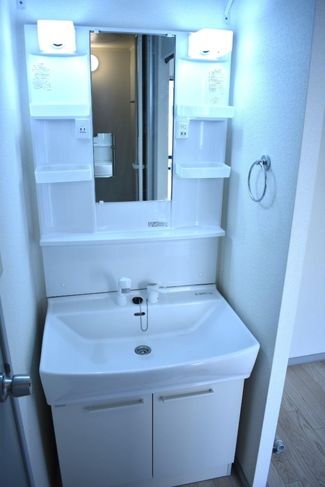 ��ʌ�����s�厚��J�{���̃A�p�[�g�̐��ʏ�