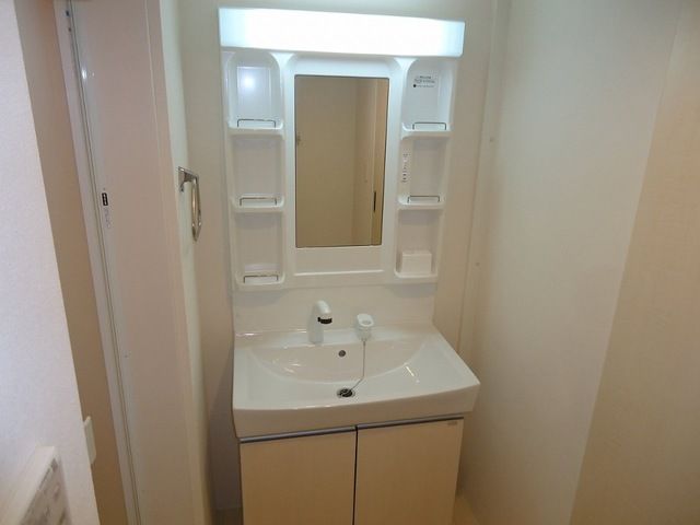 ��ʌ��@�c�s�������̃A�p�[�g�̐��ʏ�