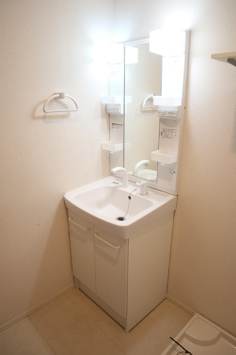 ��ʌ�����s�厚������̃A�p�[�g�̐��ʏ�