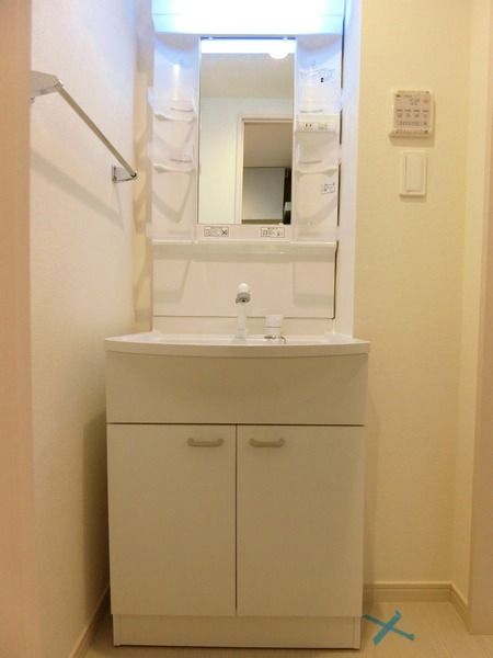 ��ʌ������s�����T���ڂ̃}���V�����̐��ʏ�